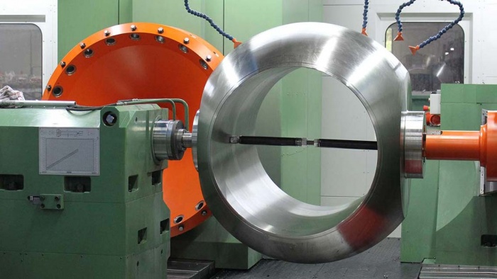 Turning and grinding centers for sphere of ball valves